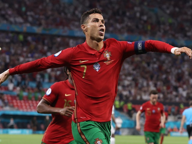 Portugal's Cristiano Ronaldo celebrates scoring their second goal against France at Euro 2020