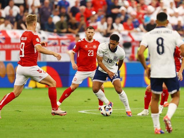 England's Jude Bellingham in action with Denmark's Rasmus Hojlund on June 20, 2024
