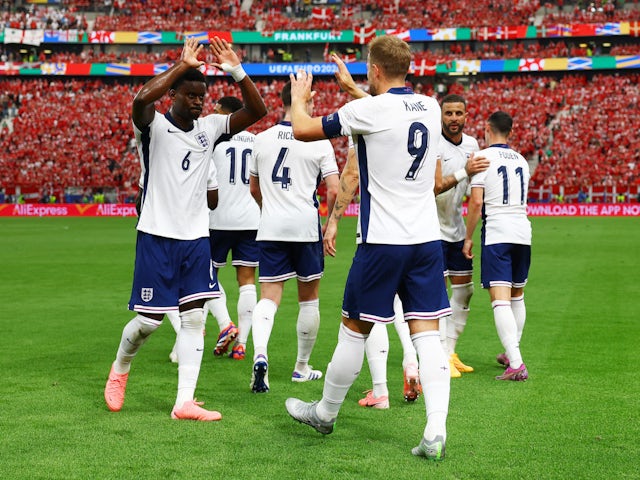 England's Harry Kane celebrates scoring against Denmark on June 20, 2024