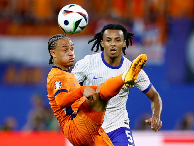 France's Jules Kounde in action with the Netherlands' Xavi Simons on June 21, 2024