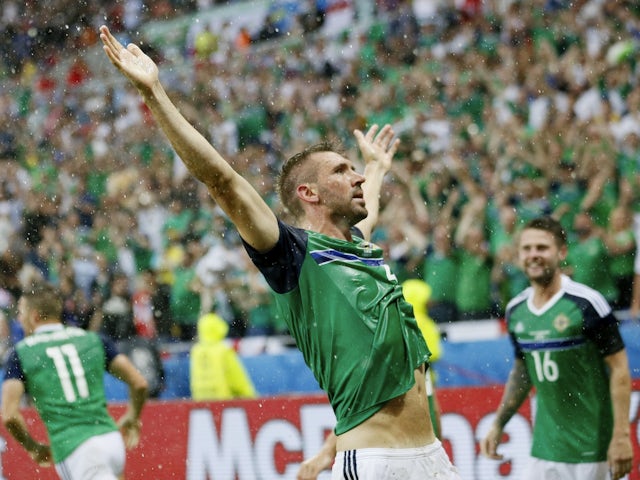 Northern Ireland's Gareth McAuley celebrates after scoring their first goal at Euro 2016