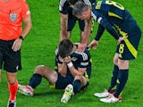 Scotland defender Kieran Tierney reacts after picking up an injury on June 19, 2024 (IMAGO)