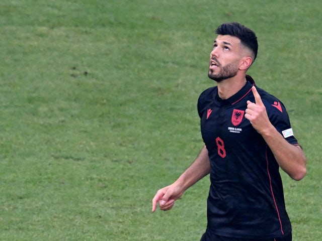 Albania midfielder Klaus Gjasula cuts a relieved figure after scoring against Croatia at Euro 2024 on June 19, 2024.