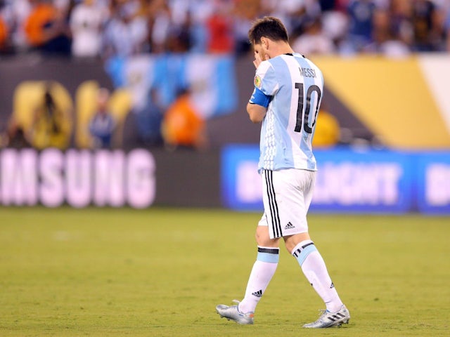 Argentina's Lionel Messi reacts after missing a penalty kick against Chile on June 27, 2016
