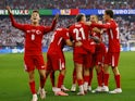 Turkey's Mert Muldur celebrates scoring their first goal with teammates as Arda Guler reacts on June 18, 2024