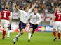 England's Michael Owen celebrates scoring their second goal with Nicky Butt on June 15, 2002