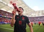 Albania's Mirlind Daku uses a megaphone to shout to supporters after the match on June 19, 2024 [IMAGO]