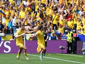 Excitable Romania stun out-of-sorts Ukraine in Group E opener