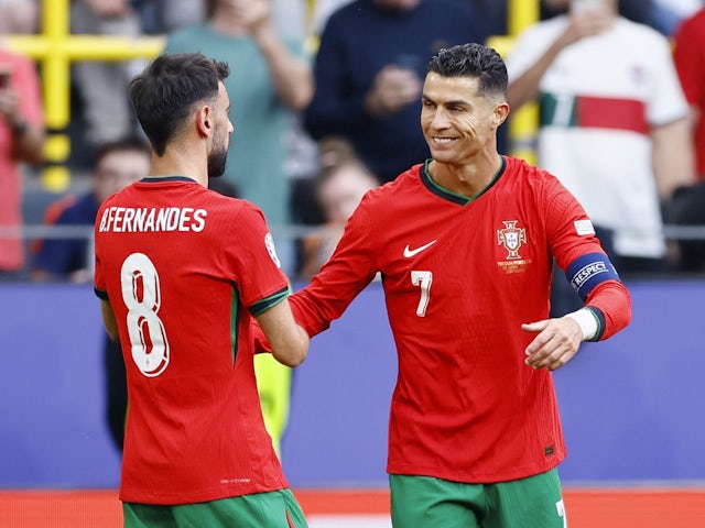 Portugal's Bruno Fernandes celebrates scoring their third goal with Cristiano Ronaldo on June 22, 2024