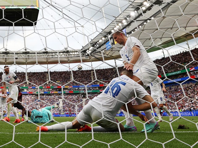 Slovakia defender David Hancko clears the ball off the line against Belgium at Euro 2024 on June 17, 2024.