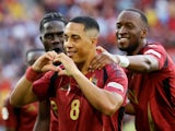  Belgium's Youri Tielemans celebrates scoring their first goal with Dodi Lukebakio and Amadou Onana on June 22, 2024
