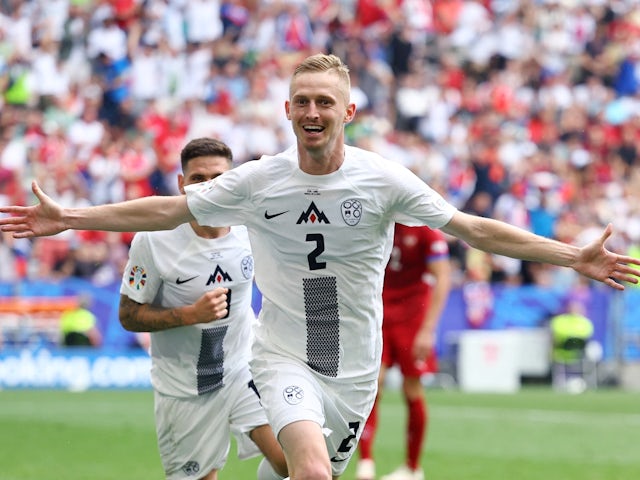 Slovenia's Zan Karnicnik celebrates scoring their first goal on June 20, 2024