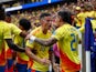 James Rodriguez celebrates with his teammates after a Colombia goal on June 24 2024