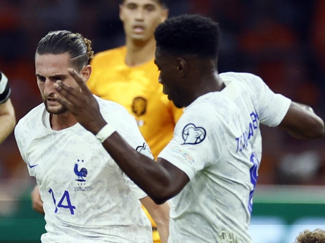 Adrien Rabiot of France, Mats Wieffer of Holland, Aurelien Tchouameni of France during the European Championship, EM, Europameisterschaft Qualifying match in group B between the Netherlands and France at the Johan Cruyff Arena in Amsterdam, Netherlands on