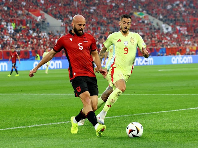 Albania's Arlind Ajeti in action with Spain's Joselu on June 24, 2024