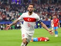 Turkey's Hakan Calhanoglu celebrates scoring their first goal on June 26, 2024