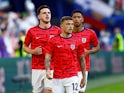 England's Declan Rice, Kieran Trippier and Jude Bellingham during the warm up before the match on June 25, 2024