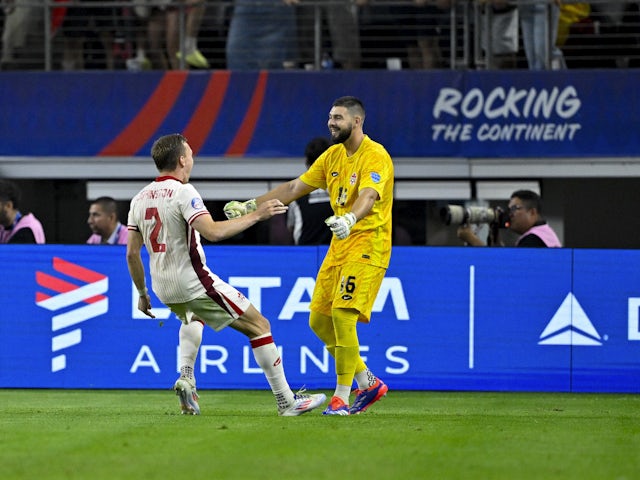  Maxime Crepeau and Alistair Johnston celebrate as Canada win their shootout on July 5, 2024