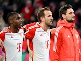 Bayern Munich's Harry Kane, Mathys Tel and Sven Ulreich celebrate after the match on February 24, 2024