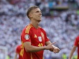 Spain's Dani Olmo celebrates scoring their first goal on July 5, 2024