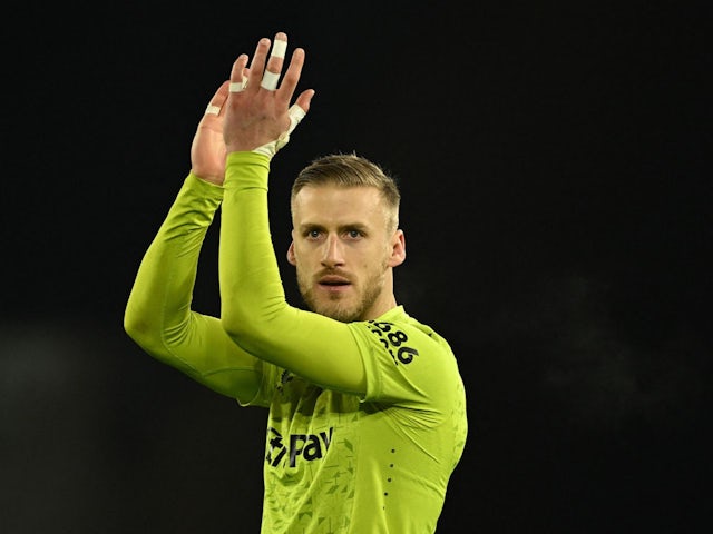 Wolverhampton Wanderers' Daniel Bentley applauds fans after the match on December 5, 2023