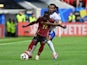 Belgium's Jeremy Doku in action with France's Jules Kounde on July 1, 2024