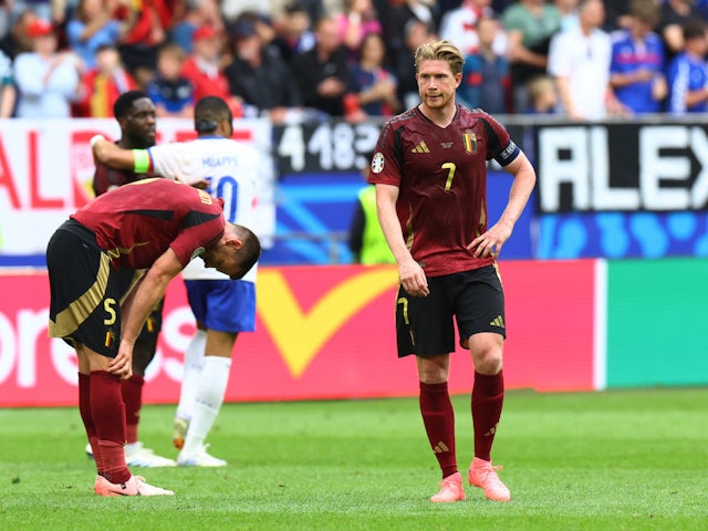 Belgium's Kevin De Bruyne and Jan Vertonghen look dejected after the match on July 1, 2024