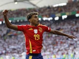 Spain's Lamine Yamal celebrates after Dani Olmo scores their first goal on July 5, 2024