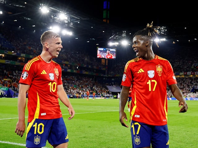 Spain's Nico Williams celebrates scoring their third goal with Dani Olmo on June 30, 2024