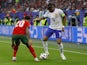 France's Kylian Mbappe in action with Portugal's Joao Cancelo on July 5, 2024
