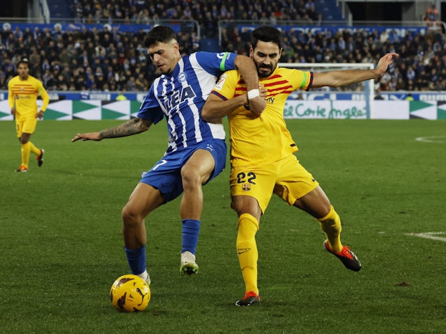 Deportivo Alaves defender Rafa Marin and Barcelona midfielder Ilkay Gundogan on February 3, 2024.