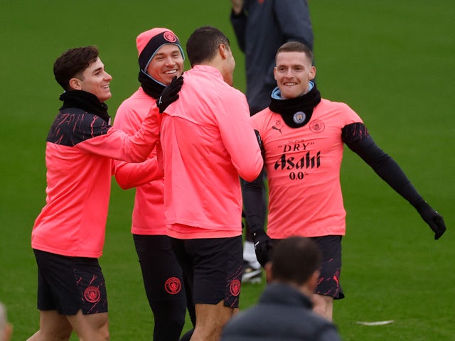 Manchester City's Julian Alvarez, Kalvin Phillips, Rodri and Sergio Gomez during training in December 2023