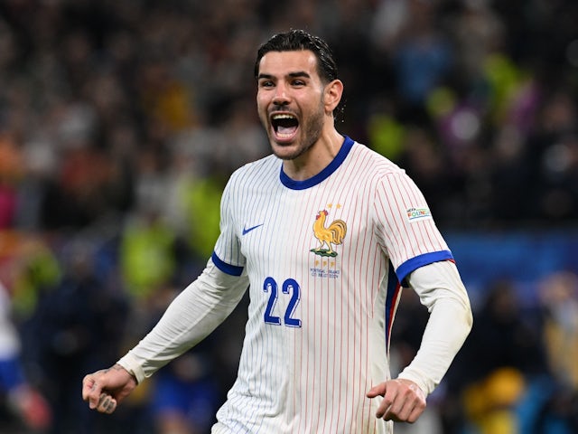 France's Theo Hernandez celebrates after winning the penalty shoot-out on July 5, 2024