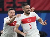 Turkey's Merih Demiral celebrates scoring their second goal with Salih Ozcan on July 2, 2024