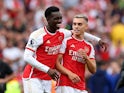 Arsenal's Eddie Nketiah celebrates with Leandro Trossard after the match in August 2023