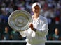 Barbora Krejcikova poses with the Venus Rosewater Dish after winning the Wimbledon title on July 13, 2024