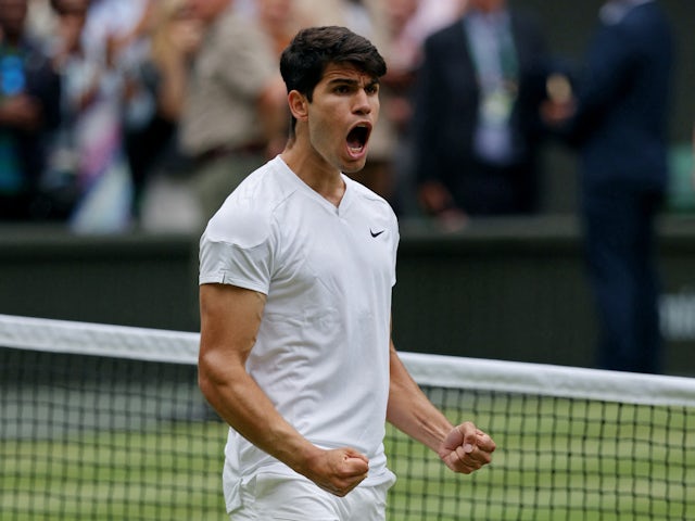 Carlos Alcaraz reacts at Wimbledon on July 12, 2024