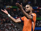 Netherlands' Cody Gakpo celebrates scoring their second goal on July 6, 2024