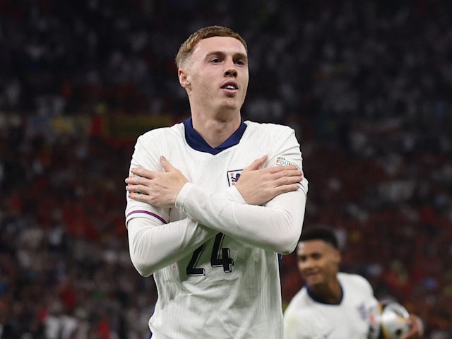 Cole Palmer celebrates scoring for England on July 14, 2024