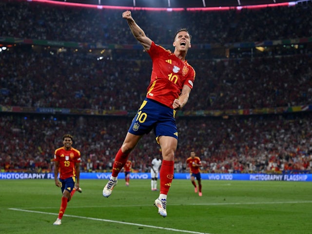 Dani Olmo celebrates Spain's second goal on July 9, 2024