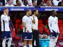 England's Cole Palmer, Luke Shaw and Eberechi Eze wait to come on as substitutes on July 6, 2024