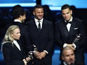 Manchester City's Kyle Walker reacts alongside Ederson and Ruben Dias after the awards in January 2024