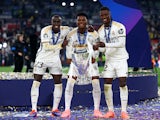 Real Madrid's Ferland Mendy, Aurelien Tchouameni and Eduardo Camavinga celebrate with the trophy after winning the Champions League on June 1, 2024