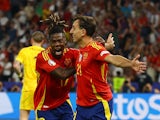 Spain's Mikel Oyarzabal celebrates scoring their second goal on July 14, 2024
