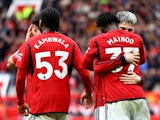 Manchester United's Kobbie Mainoo celebrates scoring their second goal with Willy Kambwala and Alejandro Garnacho on July 13, 2024