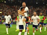 England's Harry Kane celebrates with Ollie Watkins on July 10, 2024