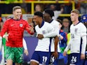 England's Ollie Watkins, Kobbie Mainoo, Cole Palmer and Dean Henderson celebrate after the match on July 10, 2024