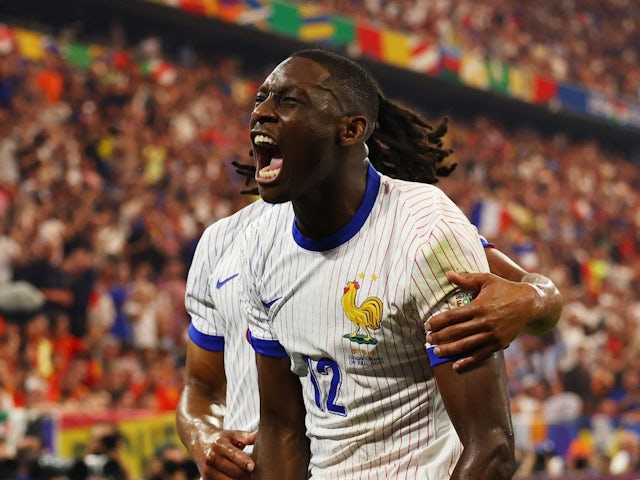 France's Randal Kolo Muani celebrates scoring their first goal on July 9, 2024