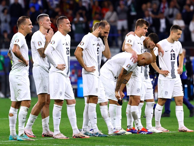 Slovenia players look dejected during the penalty shootout on July 1, 2024