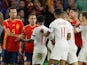 Spain's Paco Alcacer clashes with England's Raheem Sterling on October 15, 2018